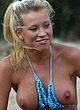 Natalie Denning plays topless on a beach pics