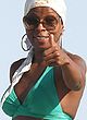 Mary Jane Blige sunbathes in green bikini pics