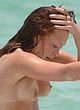 Natasha Hamilton caught sunbathing topless pics