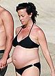 Alanis Morissette tanning pregnant in bikini pics