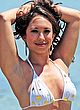 Cheryl Burke sunbathes in bikini on a beach pics