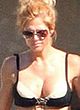 Torrie Wilson sunbathing in bikini pics
