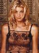 Faith Hill posing in sexy clothes pics
