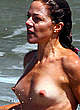 Claudia Gerini topless and titslip photos pics