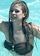 Avril Lavigne naked pics - slips ass on a beach