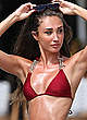 Megan McKenna in red bikini poolside shots pics