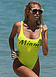 Vicky Xipolitakis sexy in yellow swimsuit pics