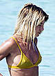 Jessica Woodley pokies in yellow bikini pics