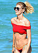 Devon Windsor in red top bikini on a beach pics