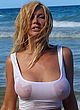 Nadeea Volianova showing boobs in wet sheer top pics