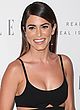 Nikki Reed busty in a low-cut black gown pics