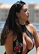 Casey Batchelor busty in a plunging swimsuit pics