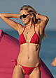 Louisa Warwick in red bikini on a beach image pics