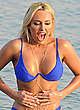 Amber Turner in blue bikini on a beach pics