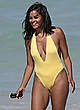 Claudia Jordan sexy in yellow swimsuit pics
