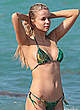 Louisa Warwick in green bikini on a beach pics