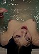India Eisley nude tits, lying in bathtub pics