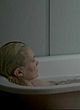 Ellen Dorrit Petersen lying in bathtub, nude nipples pics