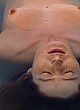 Suzan Crowley lying in water, nude & bush pics