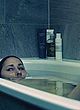 Rosalinde Mynster lying nude in bathtub pics