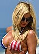Donna D'Errico shows side-boobs & bikini ass pics