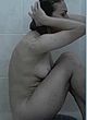 Laura Caro sitting showing boob in shower pics