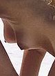 Camille Rowe topless on the beach  pics