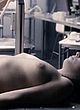 Jodie Comer lying on table exposing boobs pics