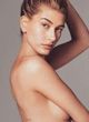 Hailey Baldwin goes topless and more pics