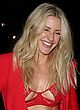 Ellie Goulding busty & leggy in a red outfit pics
