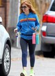 Isla Fisher looking sexy in blue leggings pics