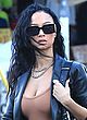 Draya Michele busty & leggy in black leather pics