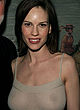 Hilary Swank shows boobs in silver dress pics