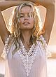 Frida Aasen posing in a see-through dress pics