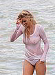Lara Stone visible boobs in wet top pics