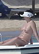 Bleona Qereti works on her tan, topless pics