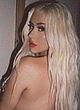 Christina Aguilera posing topless in jeans pics