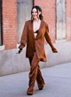 Dove Cameron stuns in a bronze pantsuit pics