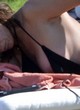 Natalie Imbruglia visible tits in black bikini pics