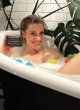 Katee Sackhoff goes topless in bathtub pics