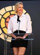 Charlize Theron wows in shirt and short skirt pics