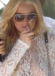 Lindsay Lohan visible tits during photoshoot pics