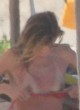 Doutzen Kroes flashing breasts, miami beach pics