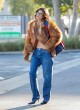 Kylie Jenner luxurious fur coat and heels pics