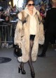 Jennifer Lopez in fur coat and black shorts pics