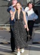 Emily Blunt polka dot dress and sneakers pics