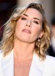 Kate Winslet looks sexy in white pantsuit pics
