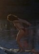Apollonia Kotero topless by the river, big tits pics