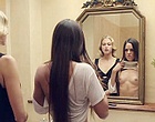 Sarah Butler flashes her tits in the mirror videos