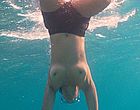 Sarita Choudhury swims topless in the ocean videos